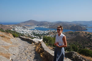 Skala harbour behind Sarah.